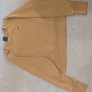 Mustard yellow, cropped, Nike, crewneck with cut out back details. Never worn